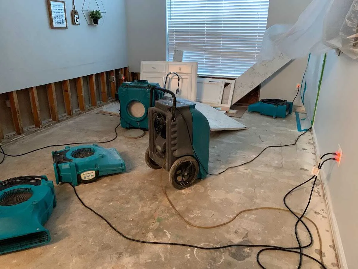 Dehumidifier in flood-cut room for Water Extraction & Removal in Badger